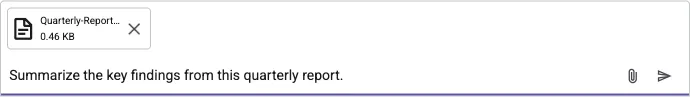 The chat input area with an attached file (quarterly report) and a question about it; on the right, the attach and send icons.