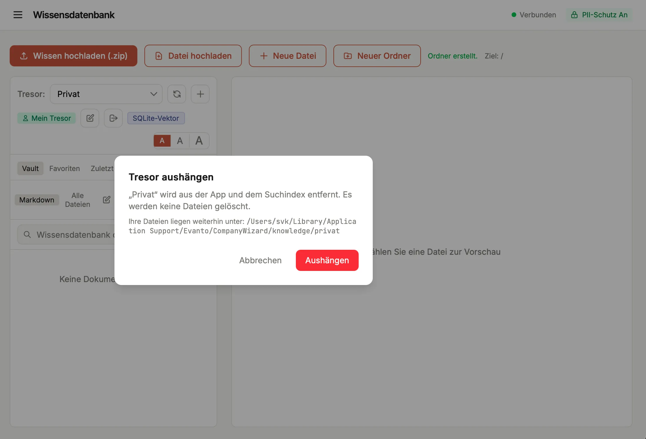 Der Bestätigungsdialog „Tresor aushängen" mit dem Hinweis, dass der Vault aus App und Suchindex entfernt wird und keine Dateien gelöscht werden, sowie der Zeile „Ihre Dateien liegen weiterhin unter:" mit dem Ordnerpfad; Schaltflächen „Abbrechen" und „Aushängen".